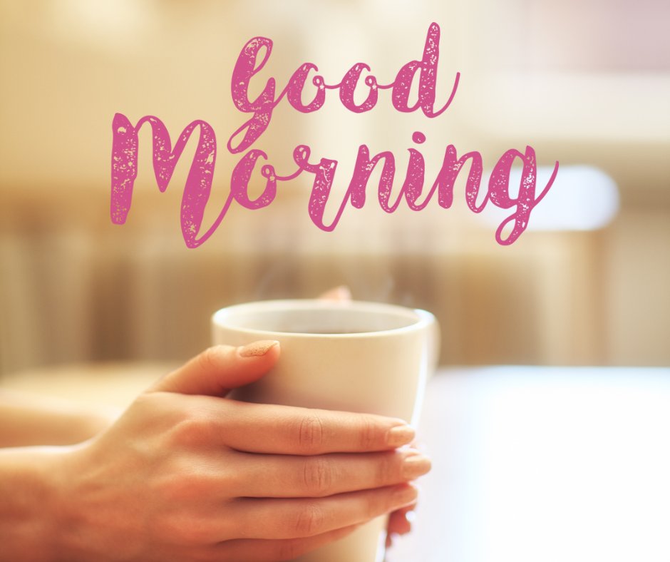 Warm and inviting good morning coffee image showing hands gently holding a large ceramic mug, with vibrant pink 'Good Morning' text overlay, creating a cozy and welcoming morning atmosphere.