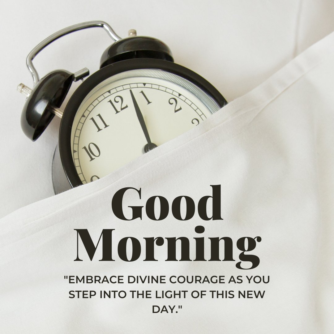 Good morning blessings image featuring a classic black alarm clock partially nestled in white bed linen, symbolizing a fresh start, accompanied by a quote encouraging divine courage for the new day.